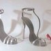 High Heel Shoe Sculptures (Version 1 right, and 2 left) in aluminum
