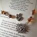 Beaded Book thong / Bookmark with vintage amber beads and silver sun charm