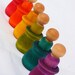 Montessori inspired matching game with peg dolls and cups