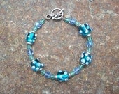 Blue Green Aqua Bumpy Beads and Faceted Glass Bracelet with Pewter Toggle Clasp