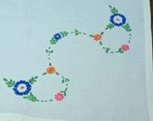 Pretty Embroidered Daisies in a Diamond Tablecloth