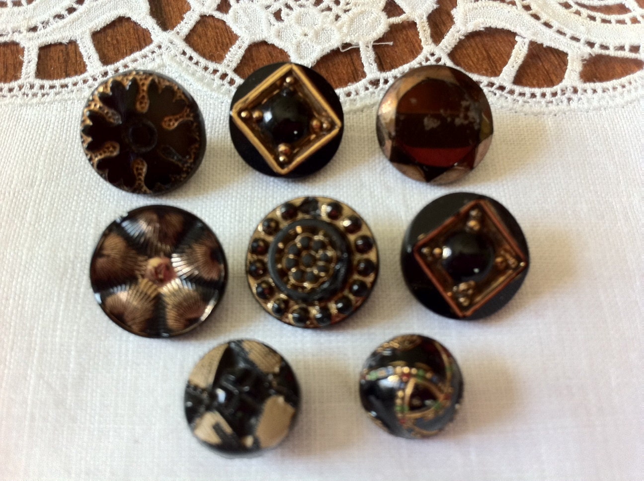 Eight Black Glass Buttons with Gold Accents, Victorian