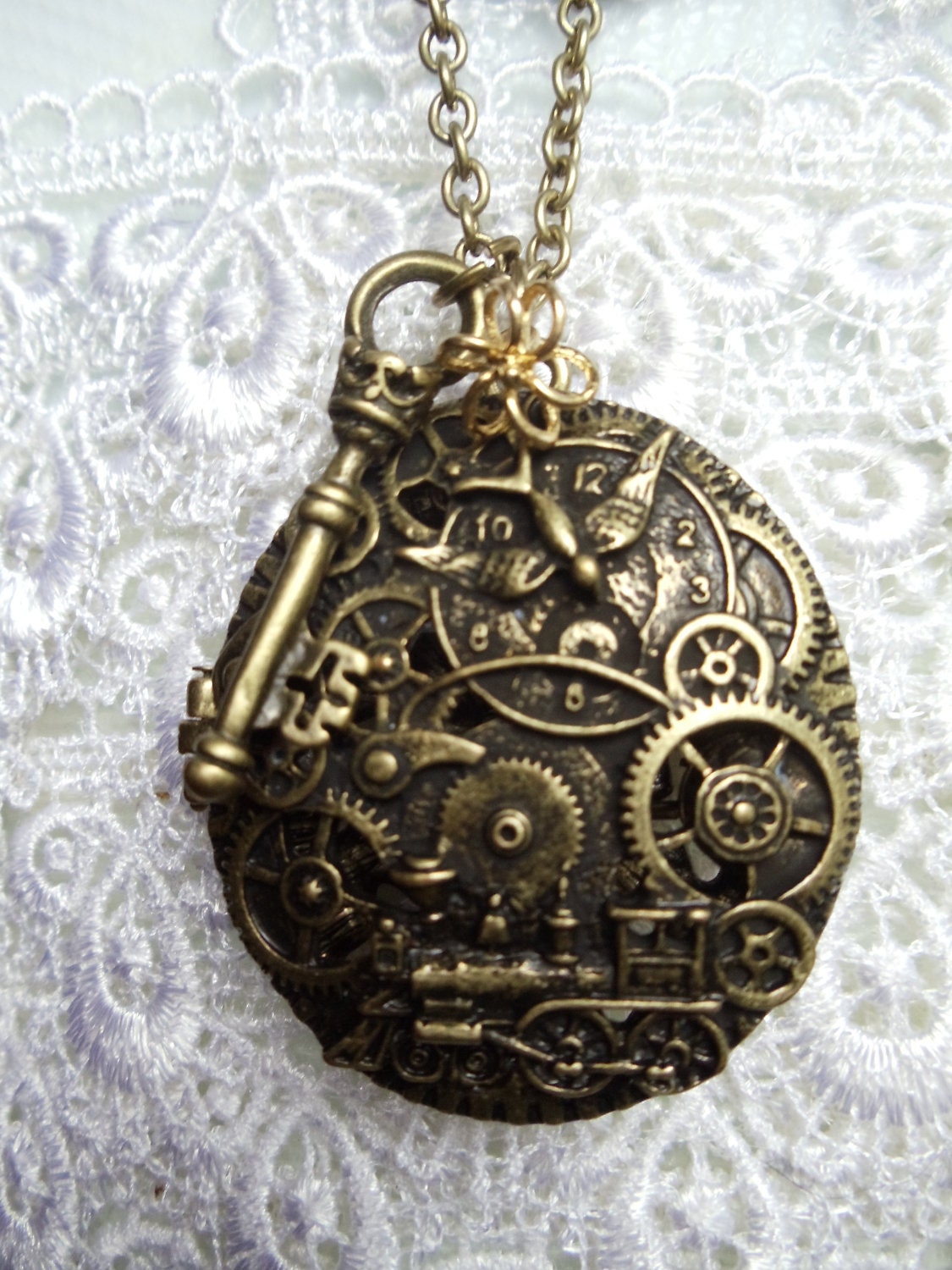 Steampunk style locket, antique bronze round locket with unique clock face charms and beaded chain