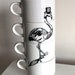 Dapper Flamingo stacking teacups