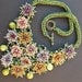 Beaded flower necklace in purple, pink, orange and green