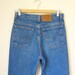 Vintage LEVIS Slim Leg Jeans with Leather Patch Label size small/medium