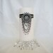 Decorative Scented White Pillar Candle, Rhinestone & Pearl Medallion, Rhinestone Chain, Black Satin Ribbon