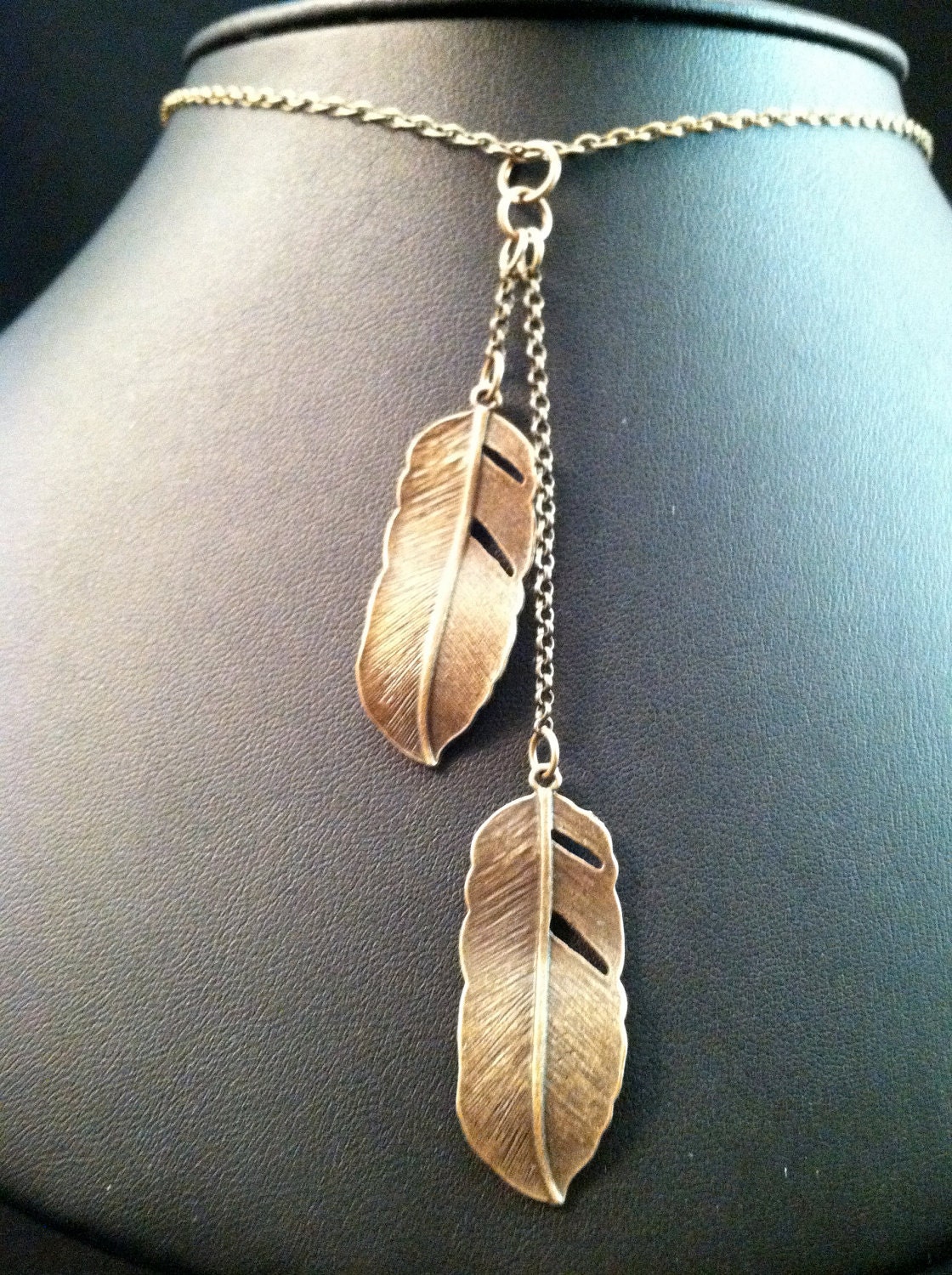 Antiqued brass feather neclace
