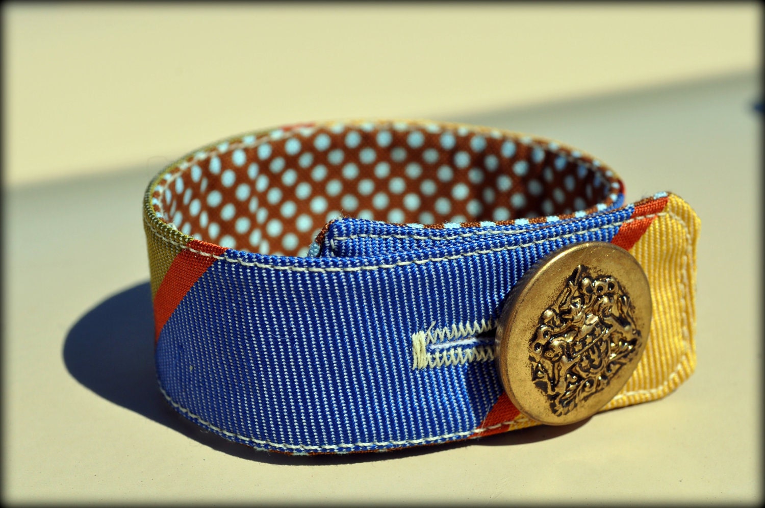 Upcycled Blue, Orange, Yellow & Green Striped Necktie Cuff Bracelet with Button Close