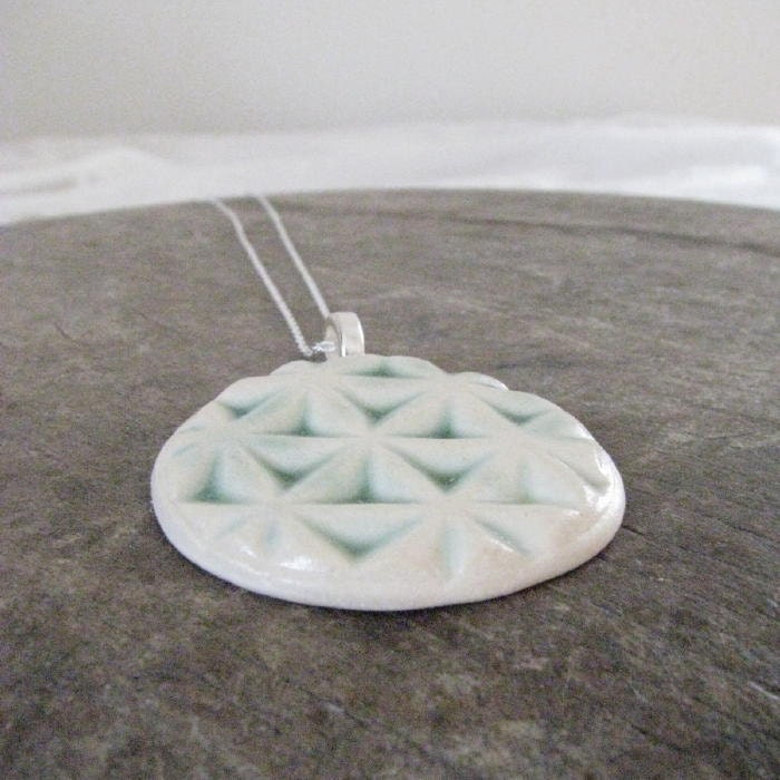 handmade ceramic necklace, geometric design, full moon, cream and soft green
