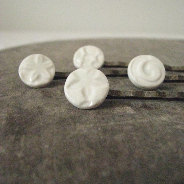 four unique ceramic hair clips, soft white