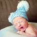 Crochet baby boy Newborn Hat with pom pom in blue and white photography photo prop.
