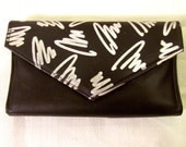 Vintage 1980s black leather wallet with silver squiggle detail