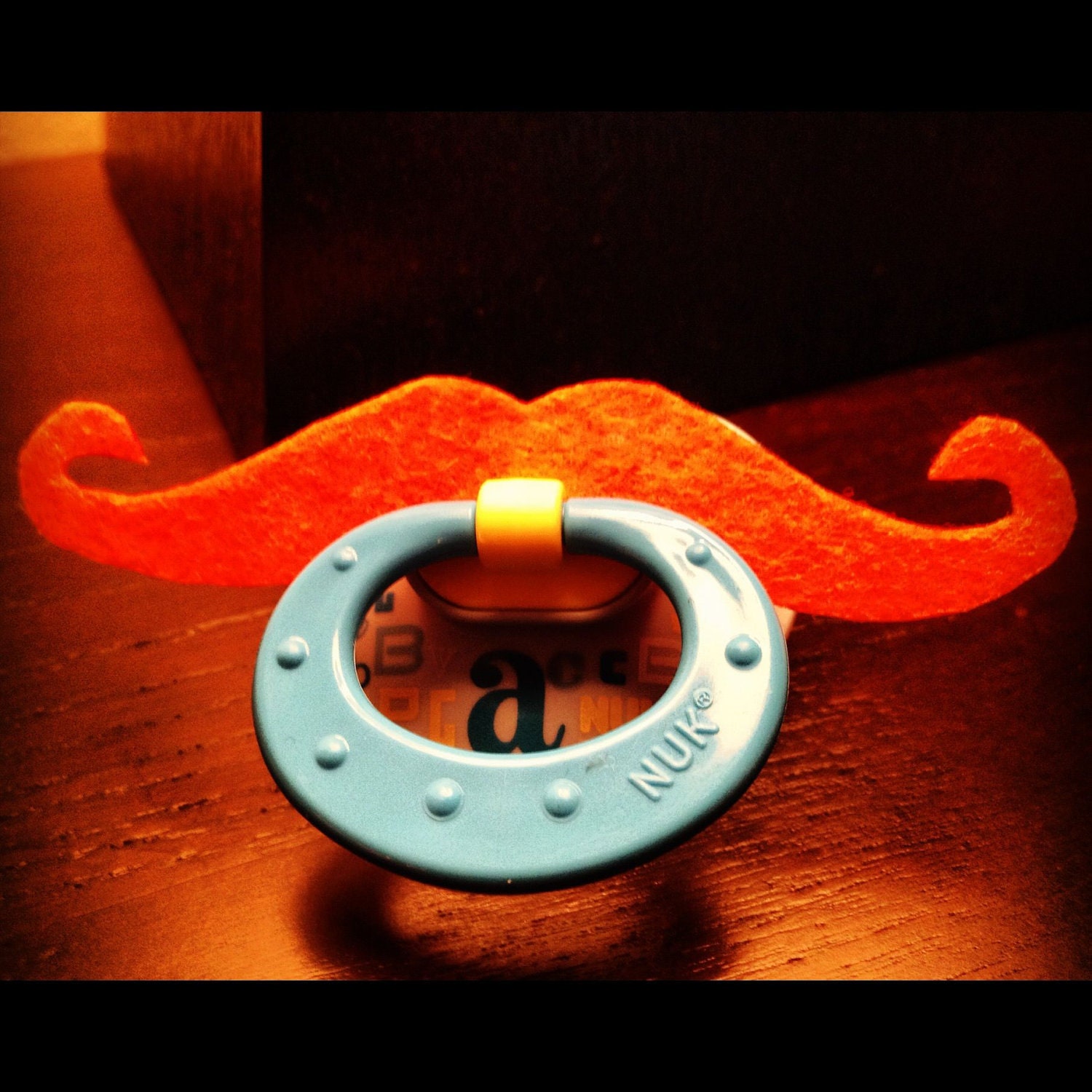 Mustache Pacifier- Orange Handlebar