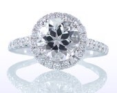 18 Karat White Gold Round Diamond Halo Engagement Solitaire Ring