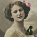 Romantic lady rose in her hair hand colored real photograph postcards