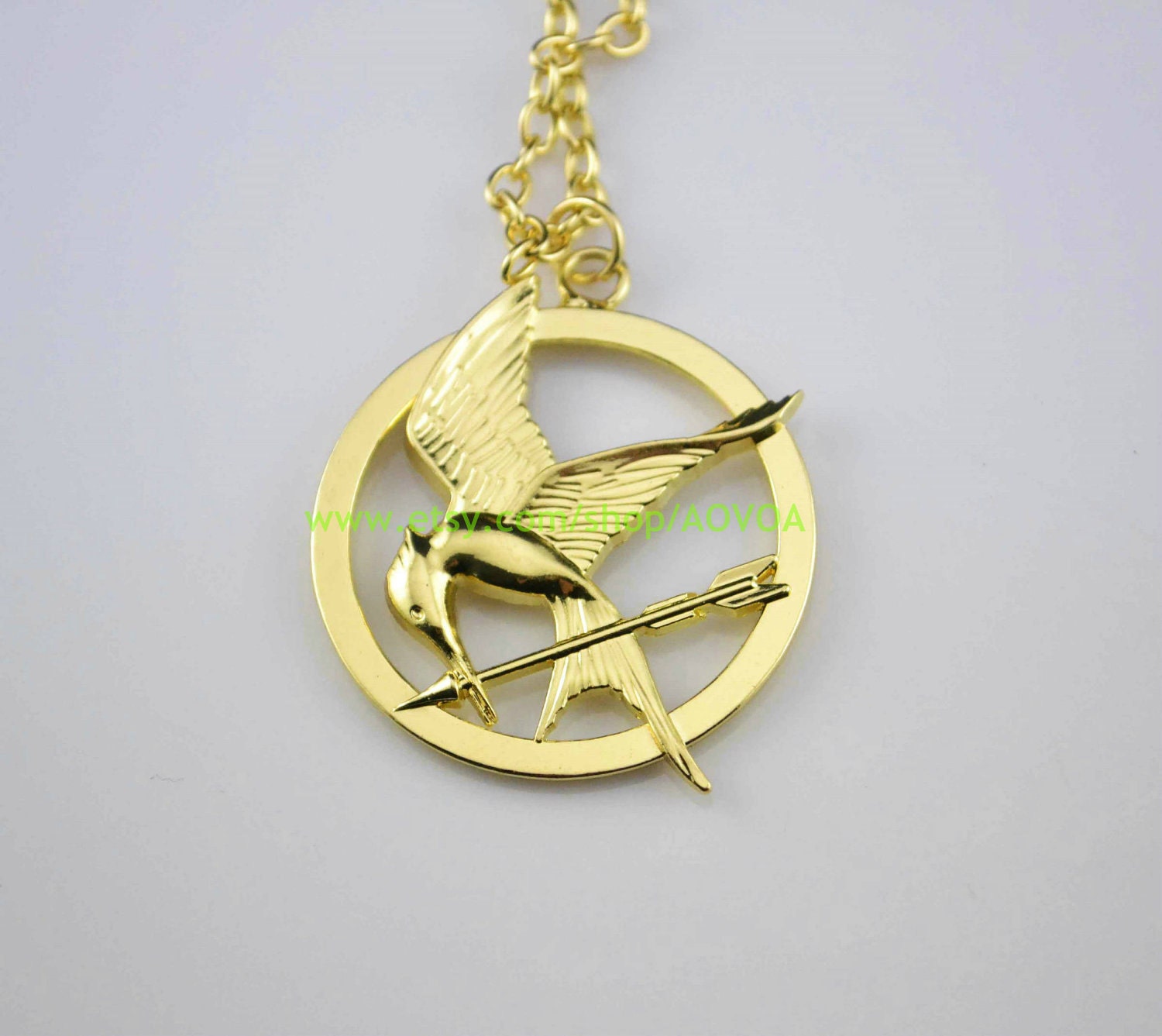 The Hunger Games logo pendant ,Inspired Mockingjay Necklace-Inspired ,arrow Necklace