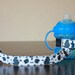 Bottle Tether, Toy Tether, Sippy Strap with Suction Cup- Cow Print