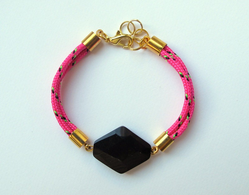 Neon pink bracelet with black faceted gemstone