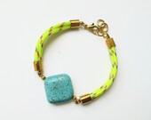 Neon yellow bracelet with turquoise coloured gemstone