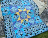 Hard Copy Maze Game quilt pattern features fabric that has a wide stripe
