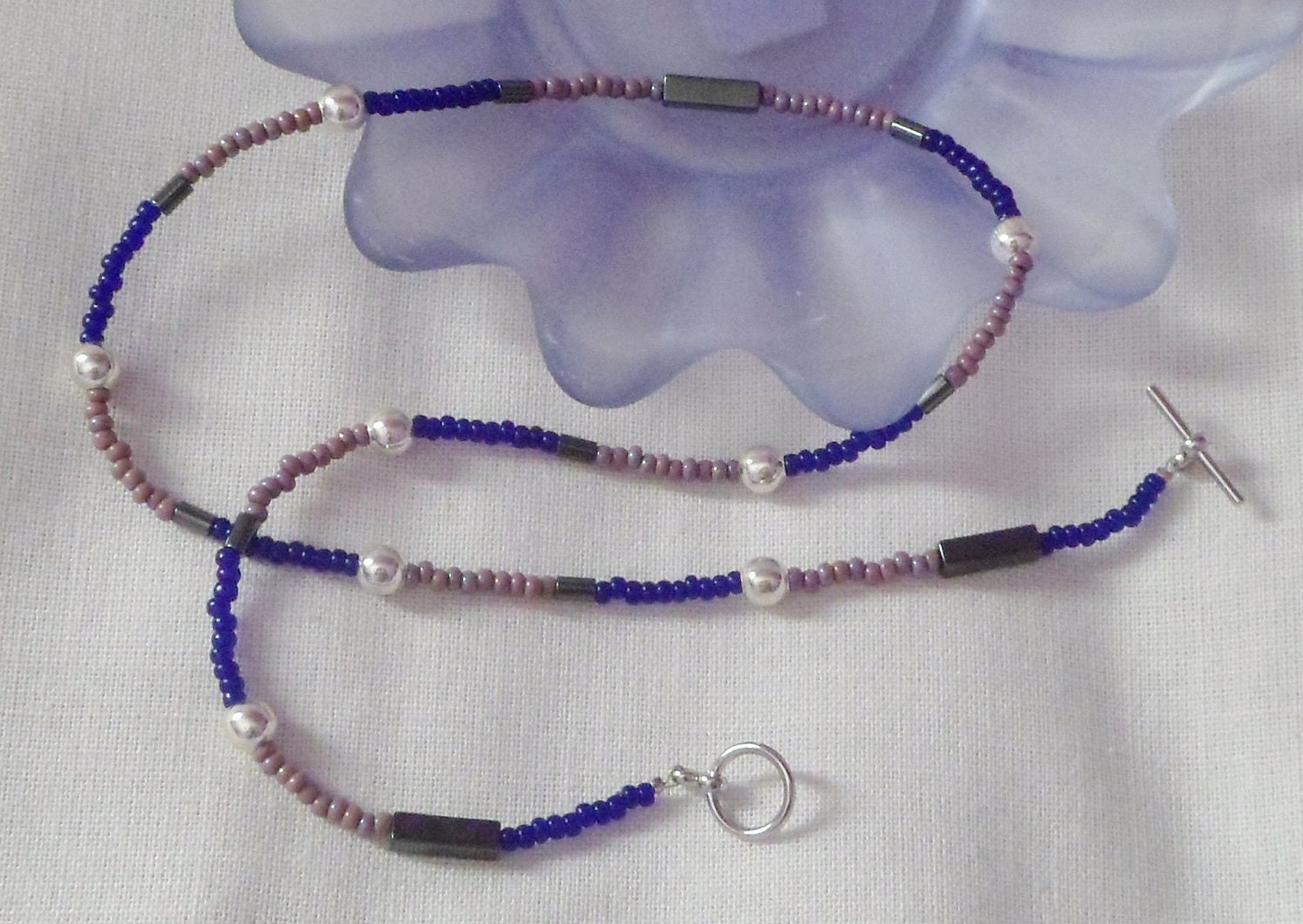 Beaded necklace of hematite, blue and lavender Czech beads & silver