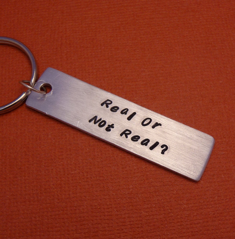 Hunger Games Inspired - Real Or Not Real, Real - A Double Sided Hand Stamped Keychain