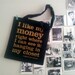 Black bag with Sex and the City quote from Carrie Bradshaw
