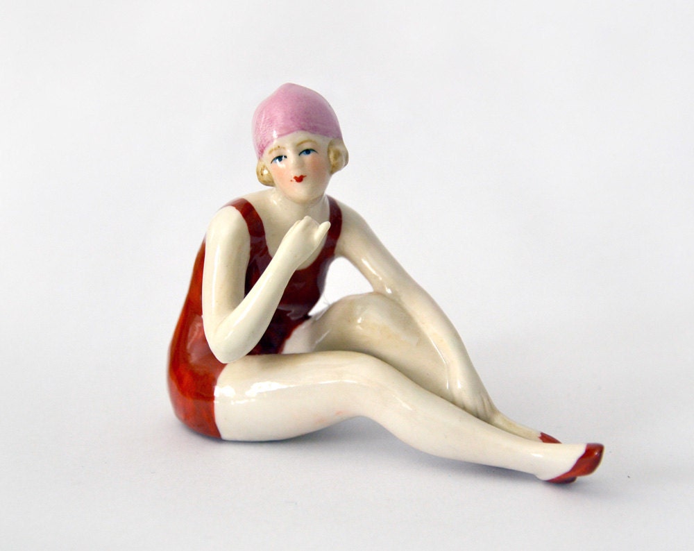Porcelain Statuette swimming girl