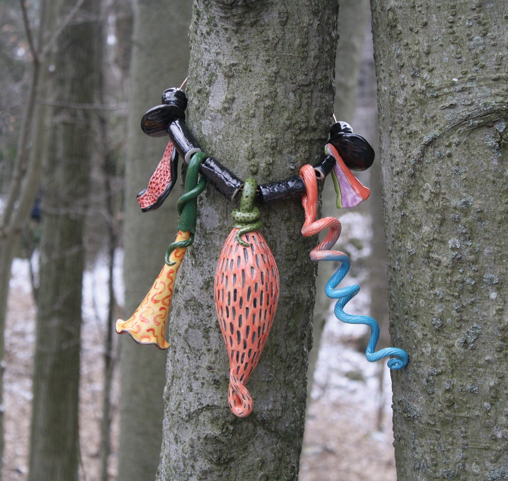 Tree Bling, pumpkin orange & black jewellery for your trees, handmade exotic, organic, ceramic baubles to decorate your tree trunks