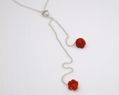 Silver necklace with a fresh water pearl and coral
