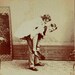 Antique stereowiew. Man carries a woman a piggyback ride. C. 1910