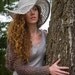 eco cowboy hat. hand crochet bamboo silk yarn. color clay. one size. lace wire brim. made to order