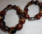 Brown & gold stretch bracelets , silver beads