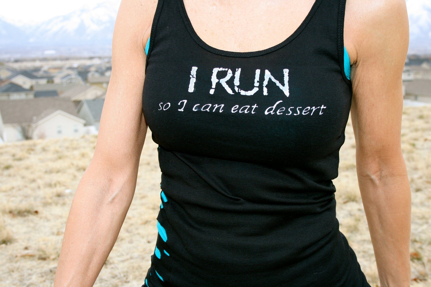 I RUN so I can eat dessert done in vintage looking silk screen on a black workout tank top with a random hole back