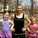 Tri Like A Mom done in vintage looking silk screen on a black workout tank top with a plain back