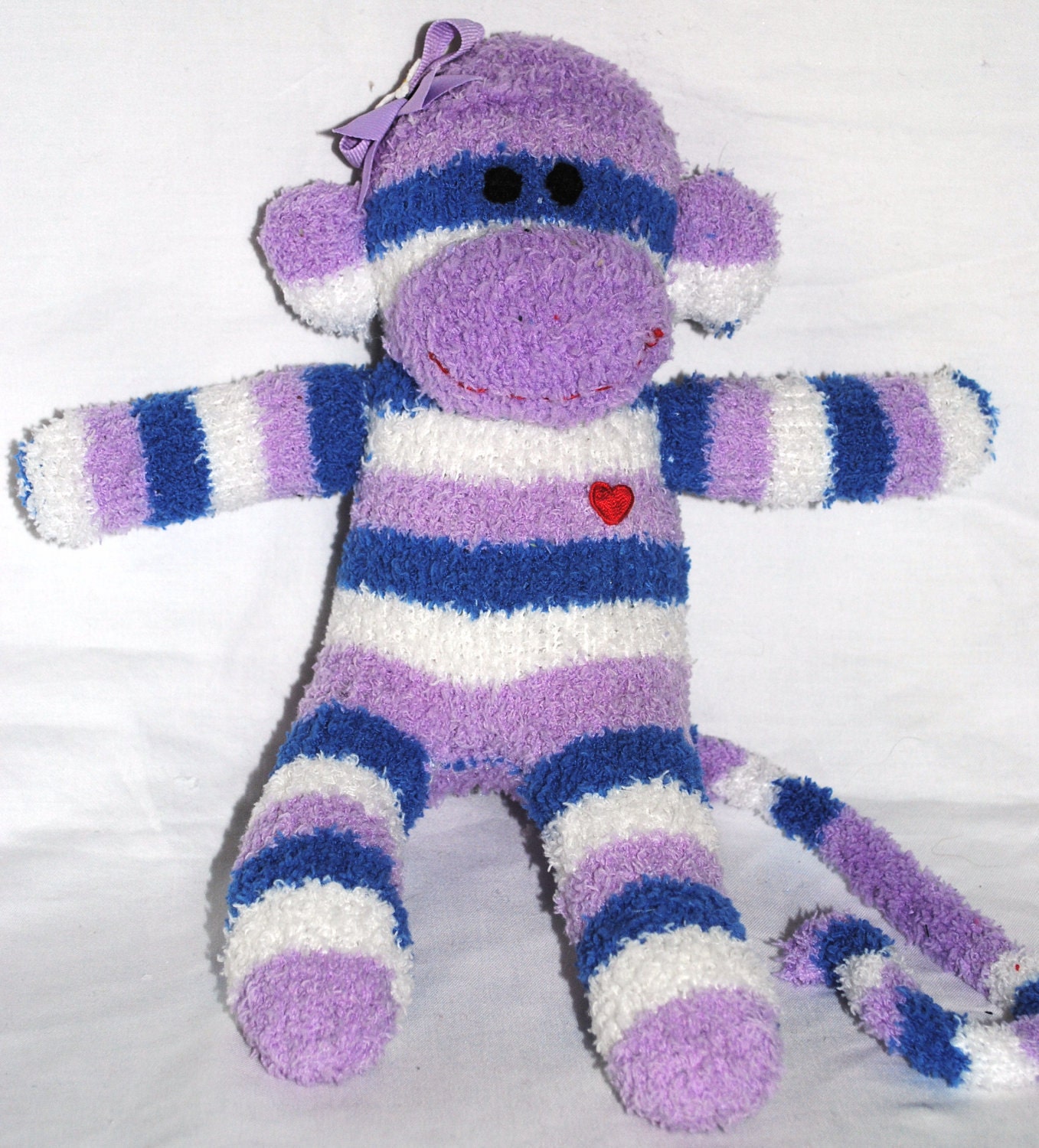 MISSY...... the blue, white and purple striped sock monkey