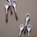 set of spoons in brown earthenware