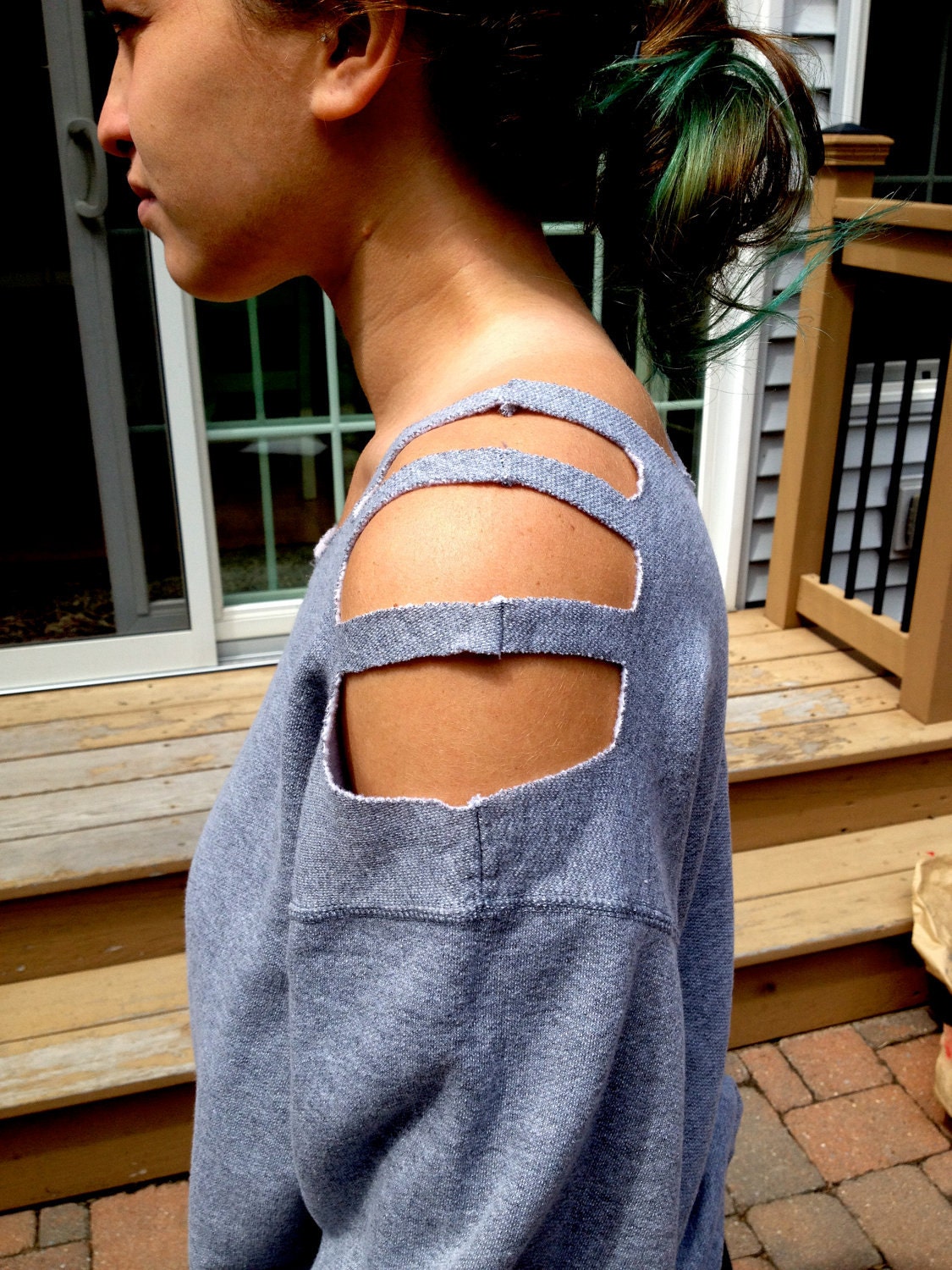 Shoulder cut sweatshirt