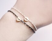 tiny skull bracelet - matt 14kt gold plated skull on BLACK chain