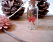 Magnificent Red Butterfly Sitting Atop A Rose Bud Miniature Terrarium Necklace Glass Vial - Woodland Apothecary