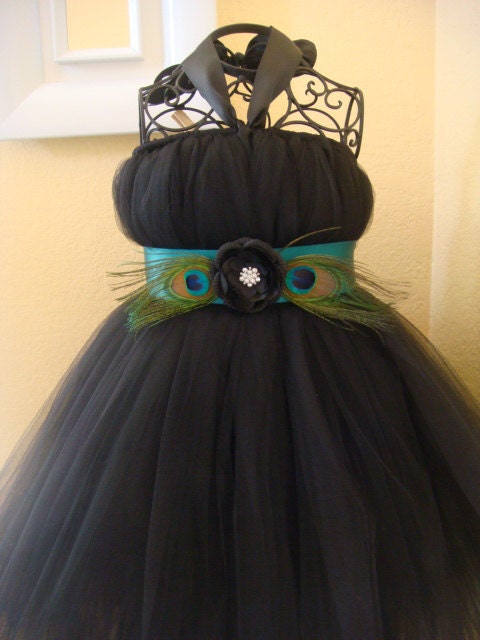 Black tutu dress with teal peacock belt