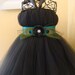 Black tutu dress with teal peacock belt