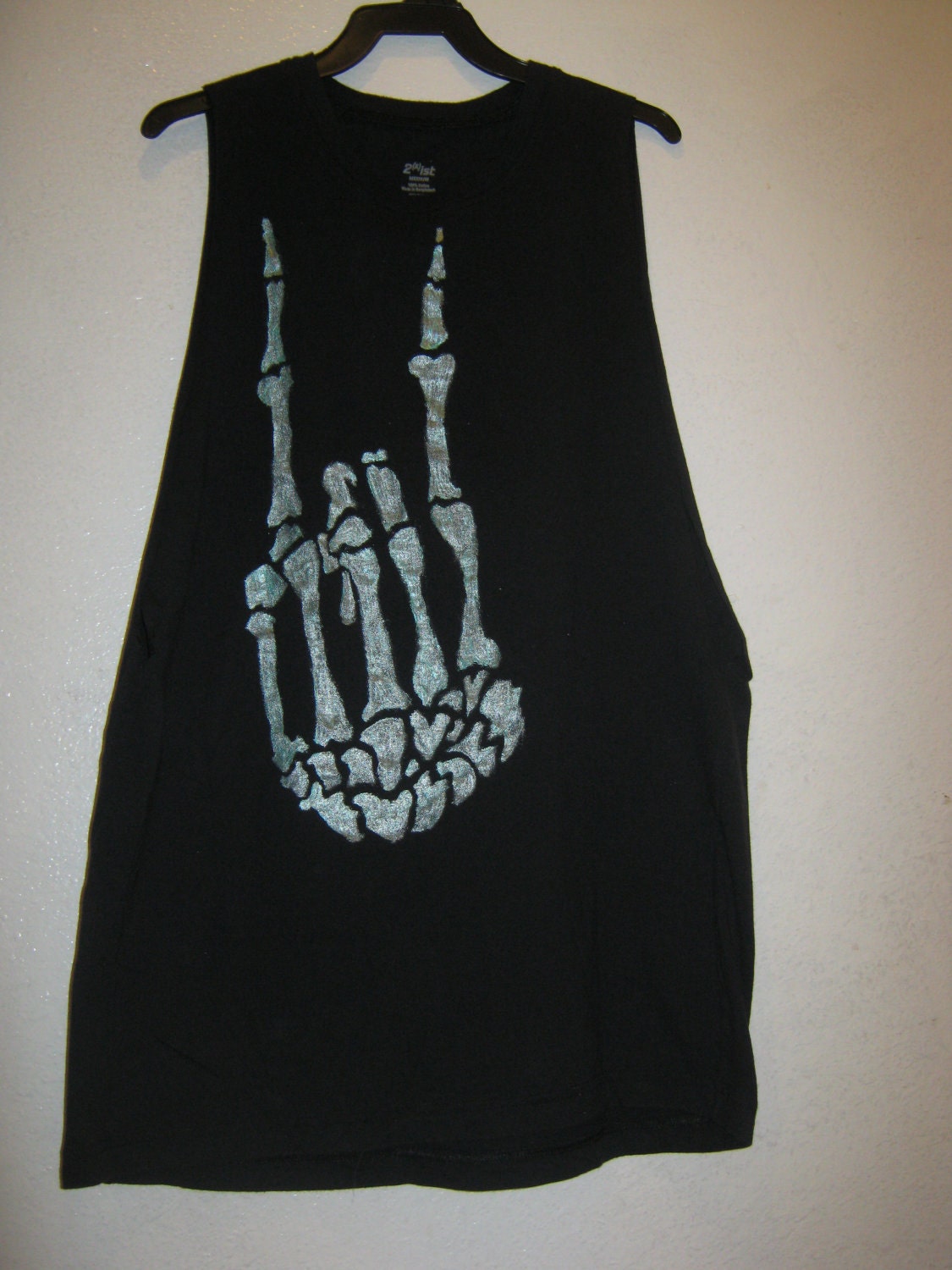 Sleeveless black skeletal hand tee