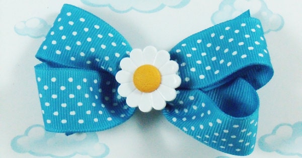 Blue polka dot hair bow with daisy flower