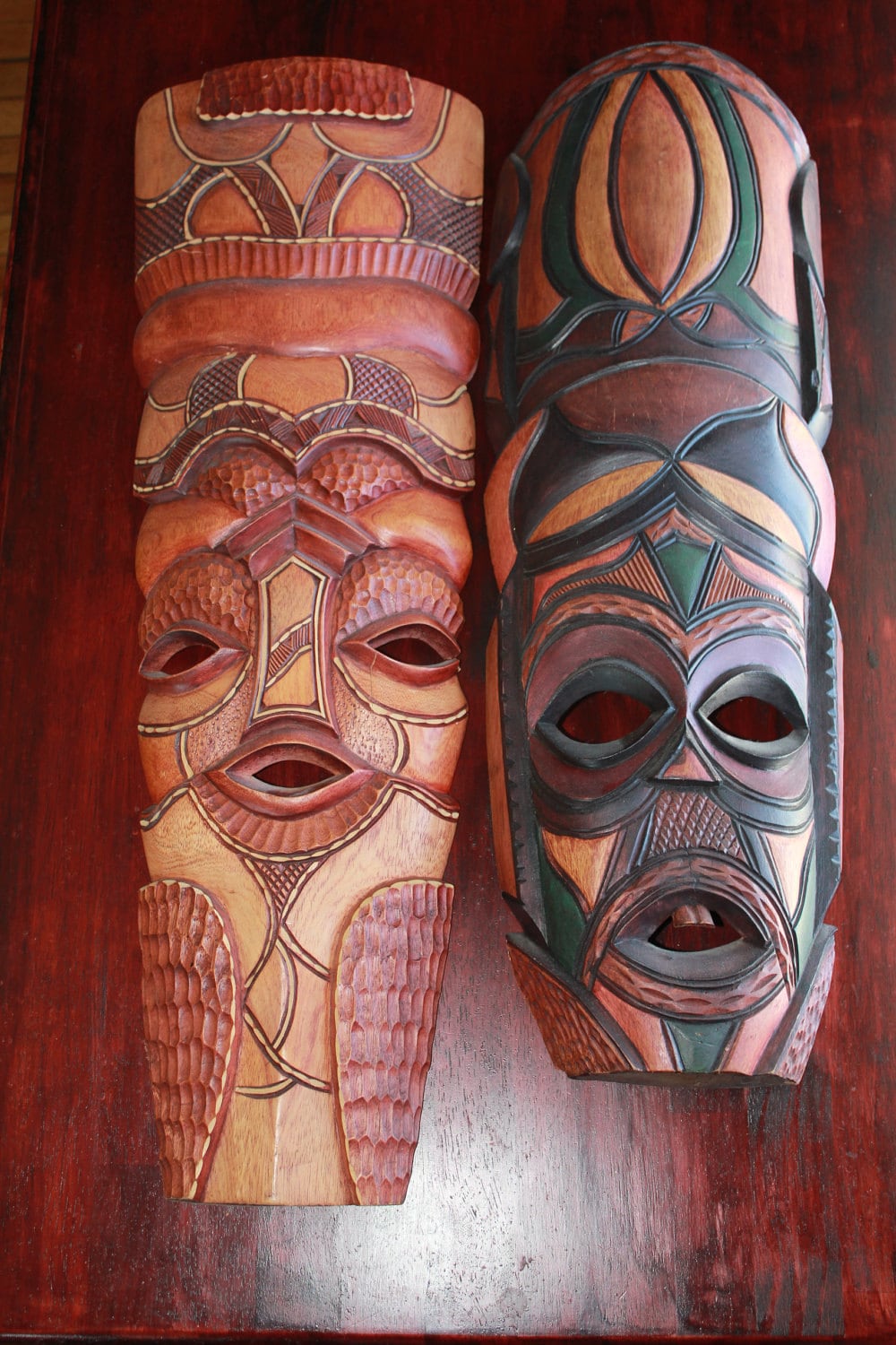 African Masks: Two large vintage hand carved wooden masks from Swaziland.