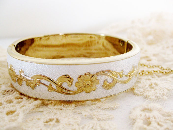 1960s white enamel flower gold hinged bracelet. IN FULL BLOOM