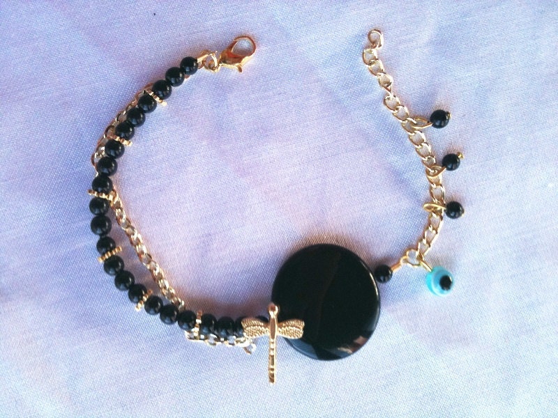 imitation black bead and golden bracelet wristband