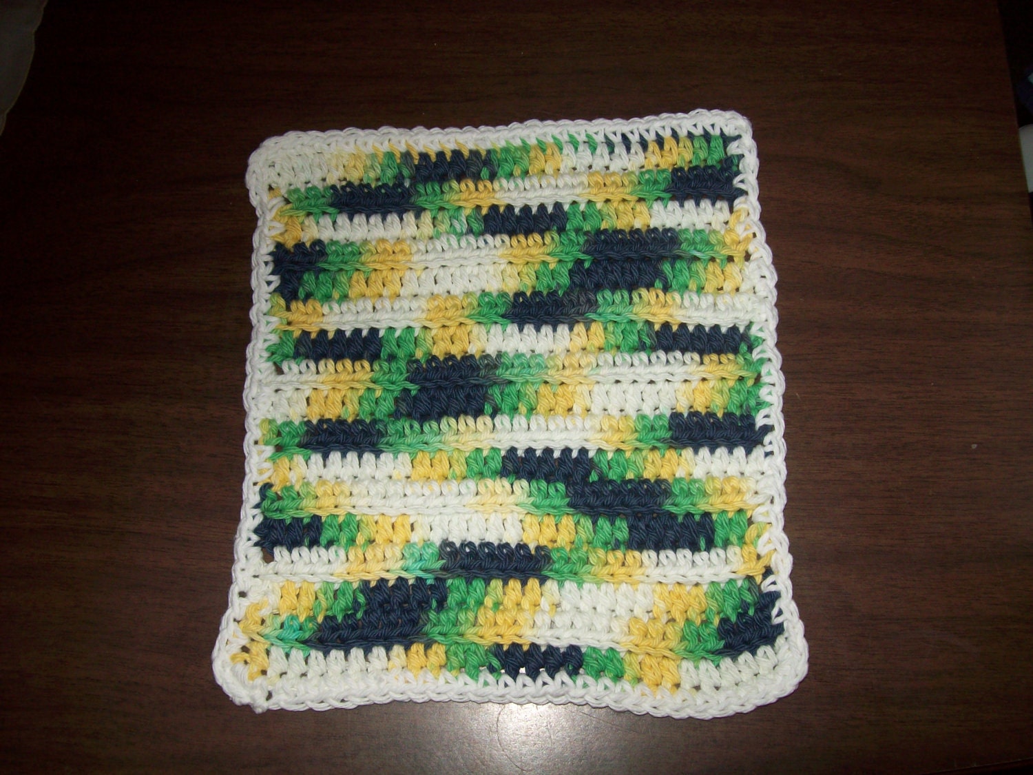 Crocheted Wash Cloth or Dish Cloth in Varigated Green Yellow and White with White Trim
