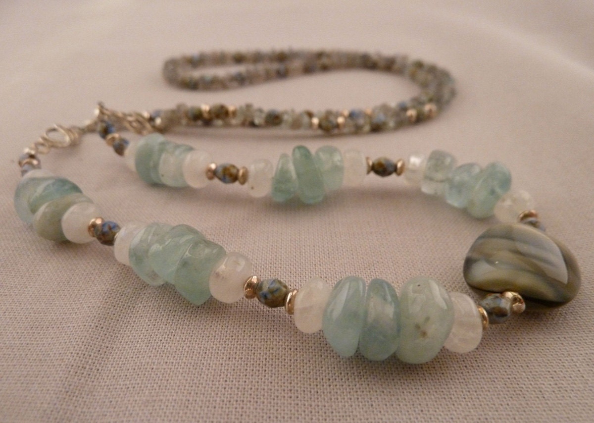 Elegant blue and gray beaded long necklace with silver accents